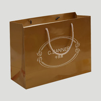 白卡纸袋 定做环保服装购物袋创意纸质手提礼品袋定制_250x250.jpg