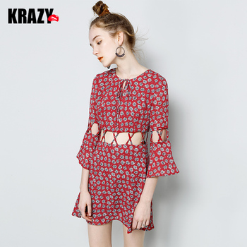 Krazy2017夏 镂空小心机纤细腰身交叉镂空度假风喇叭袖碎花连衣裙